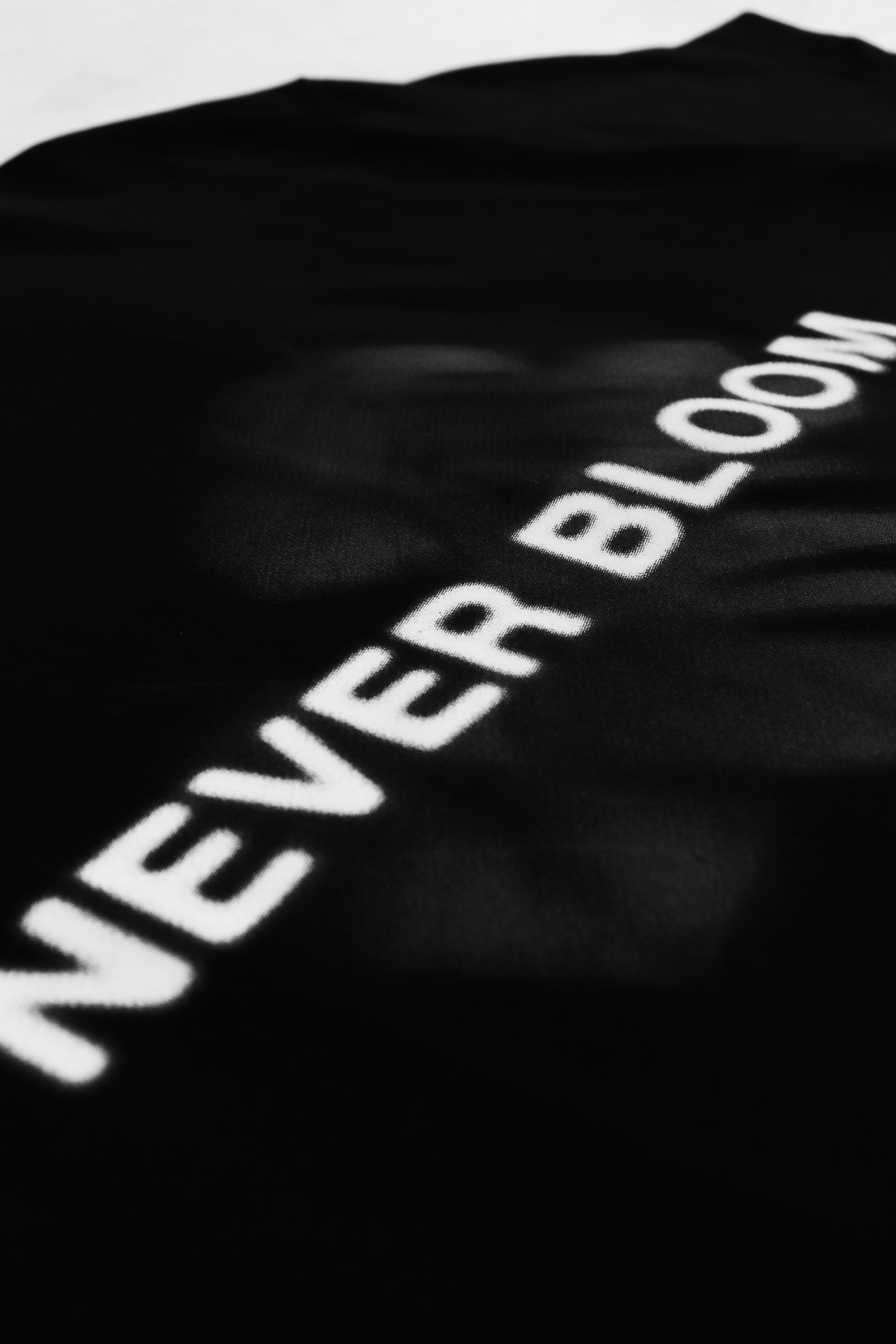 Never Bloom Logo Tee Black